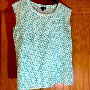 Short sleeve blouse with teal geometric designs, size large from The Limited